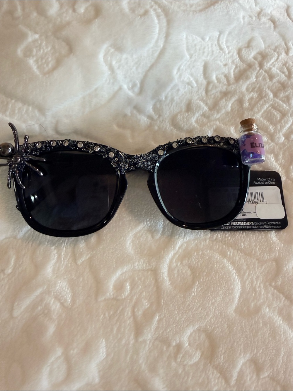 Foster Grant Black Rhinestone Sunglasses with Spider Accent